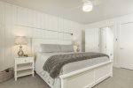 The master bedroom features a king size bed